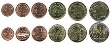 Aserbajdsjanske qapik-mønter. Øverste række - forside (forfra), nederste række - bagside (bagpå).