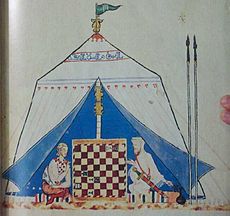 Libro de los juegos , Alfonso X z Kastylii, przedstawiający muzułmanina grającego chrześcijanina.