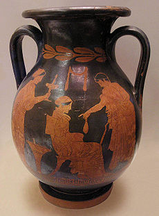 En ung man erbjuder pengar till en kvinna (en grekisk vas).  