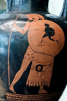 Un hopliți de Alkimachos, pe un vas attic cu figură roșie, ~460 î.Hr. Scutul are o perdea ca protecție împotriva săgeților