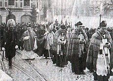 Today rare Catholic life in public space: in the foreground canons in their almutia at the consecration of Bishop André Bovet, 1912.