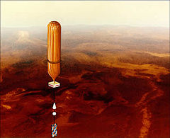 Een onderzoeksballon die boven het oppervlak van Venus vliegt.