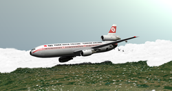 Een CGI-weergave van vlucht 981 van Turkish Airlines, vlak na het bezwijken van het vrachtluik, vlak voor het neerstorten.  