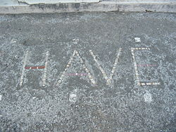 El mosaico "HAVE" (variante ortográfica de Ave)  