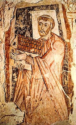 Afbeelding van St. Benet (Benedictus) Biscop die [de tradities van] de Sint-Pietersbasiliek naar Brittannië bracht.