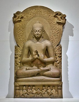 Buddha in teaching gesture (dharmachakramudra), Sarnath Museum; below the throne seat his disciples worship the 'wheel of teaching'.