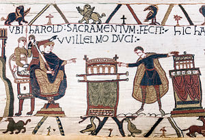 HAROLD SACRAMENTUM FECIT VVILLELMO DUCI (" Harold svor en ed till hertig Vilhelm"). Bayeuxtapeten: Denna scen sägs ha utspelat sig i Bagia (Bayeux, troligen i katedralen i Bayeux). Den visar hur Harold rör vid två altare med den tronande hertigen som tittar på, och är central för den normandiska invasionen av England.  