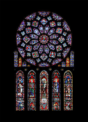 Trandafirul transeptului nordic al Catedralei din Chartres. Acesta o reprezintă pe Fecioara Maria ca Regină a Cerului, înconjurată de regii și profeții biblici. Fereastra include stemele Franței și Castiliei