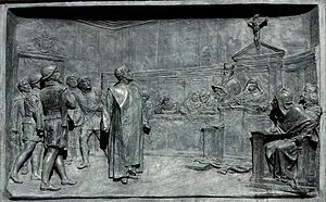 Proces s Giordanom Brunom pred rímskou inkvizíciou. Bronzový reliéf od Ettoreho Ferrariho