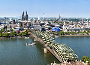 View over the center of Cologne. From left to right: Cologne Old Town, Philharmonic Hall, Museum Ludwig, Cologne Cathedral, Hohenzollern Bridge, Central Station, Musical Dome. In the background the Colonius telecommunications tower and the Kölnturm in Mediapark (August 2017).