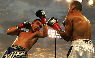 Lightweight boxers Ricardo "Pelón" Dominguez (left) and Rafael Ortiz during a fight on August 9, 2005.