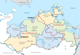 The historical districts of Mecklenburg and Western Pomerania, separated by the dashed red line. Shown are the counties since the 2011 reform.