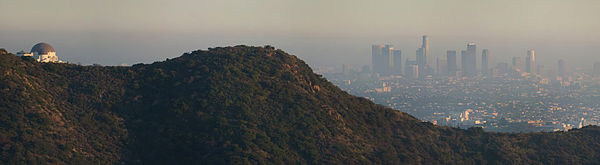 The center of Los Angeles lies in smog, seen from the Hollywood Hills