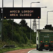 Een bord op de M25 in Londen vertelt automobilisten om de stad te vermijden.  