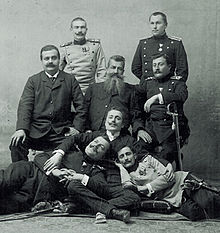 Group portrait of members of the Black Hand. Lying on the left Dragutin Dimitrijević and on the right Vojislav Tankosić.