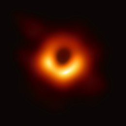 Image calculated from radio images of the Event Horizon Telescope showing the supermassive black hole of the galaxy M87. The black disk in the center of the image is about 2.5 times the size of the event horizon (Schwarzschild diameter about 38-1012 m) of the supermassive black hole in the center.