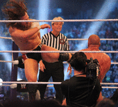 Bryan die "Yes!" Schoppen tegen Triple H's borst tijdens WrestleMania XXX  