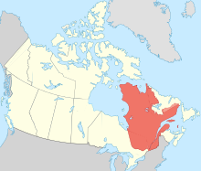 Quebec (em laranja) no Canadá (em amarelo claro)