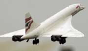 Rear view of a Concorde taking off in British Airways livery