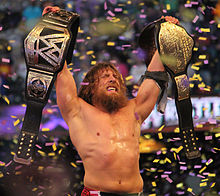 Bryan comemorando depois de ganhar o Campeonato Mundial de Pesos Pesados da WWE em WrestleMania XXX