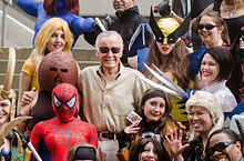 In 2012, X-Men co-inventor Stan Lee (center, uncostumed) posed with cosplayers depicting X-Men characters Juggernaut and Sabretooth (left) and Wolverine, Gambit and Storm (right), among others.