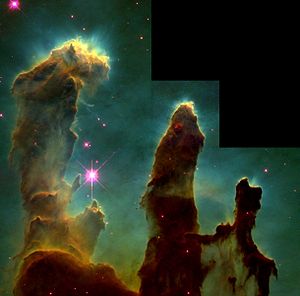 Een van de beroemdste beelden gemaakt door de Hubble-telescoop: de "Zuilen der Schepping" in de Adelaarsnevel