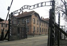 Entrance gate to Auschwitz I concentration camp (main camp) with the inscription "Arbeit macht frei" (2007)