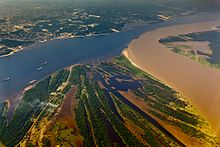 Confluence of Rio Negro and Amazon River (Blackwater River and Whitewater River) at Manaus, Amazon.