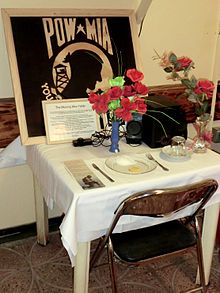 Missing Man Table as a place of honor for missing and fallen soldiers in a dining hall in Afghanistan.
