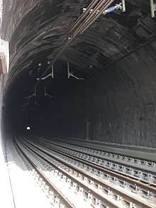 Gemmenicher Tunnel with two rail tracks and a special middle track for extra-wide large-volume transports