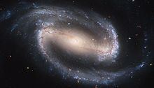 Una galassia a spirale barrata