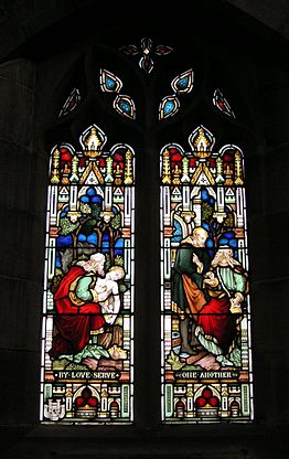 Kostelní okno s příběhem o milosrdném Samaritánovi.