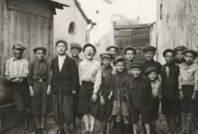 Young students of the Nieviazer Cheder in the courtyard of a synagogue, 1934.