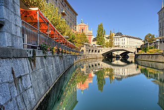 The central promenade runs along the Ljubljanica River, which is crossed by more than a dozen bridges.