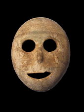 Stone mask from the pre-Ceramic ­Neolithic period ­around 7000 BC, one of the oldest masks in the world (Musée Bible et Terre Sainte, Paris)