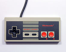 The gamepad of the NES; on the left the directional pad, on the right the action buttons