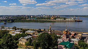 The spit of Nizhny Novgorod, known as the merger of the Oka and the Volga. On the spit is the Alexander Nevsky Cathedral and Mass. On the other bank of the Oka is a Church of the Nativity.