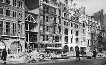 Pall Mall with reconstruction work as a result of a German air raid in February 1944