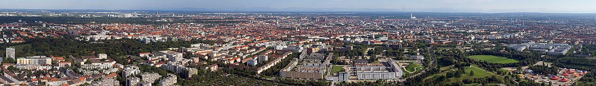 Panoramic view of Munich city center taken from the Olympic Tower. In the foreground Luitpoldpark and Olympiapark, top left the English Garden.