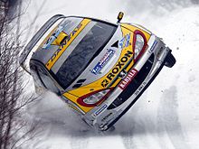 A Peugeot 206 WRC at the Rally Sweden 2003 on snow