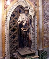 Statue of John the Baptist below the papal altar in the Lateran Basilica dedicated to him.