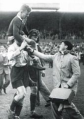 Wallabies captain John Solomon is carried by the Springboks (1953)