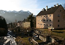 South Tyrolean settlement from the Daneubrücke. The bed enclosures and other structures in the vicinity of the Galgentobelbach stream have since been demolished in favour of better drainage.