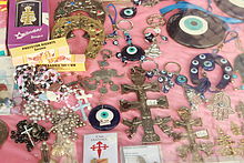Amulets and talismans in a window display in Porto, Portugal