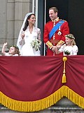 Prins William, hertog van Cambridge en Kate Middleton op het balkon van Buckingham Palace.  