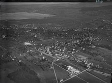 Aerial view of Wetzikon in the direction of Pfäffikersee by Walter Mittelholzer (1931)