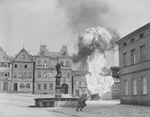 Two US soldiers flee when a petrol tank trailer explodes­, Kronach (Upper Franconia), 14 April 1945.